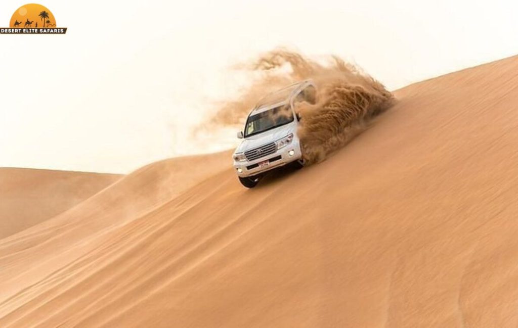 Dubai desert safari dune bashing in 4x4 Land Cruiser on high red dunes – extreme adventure experience