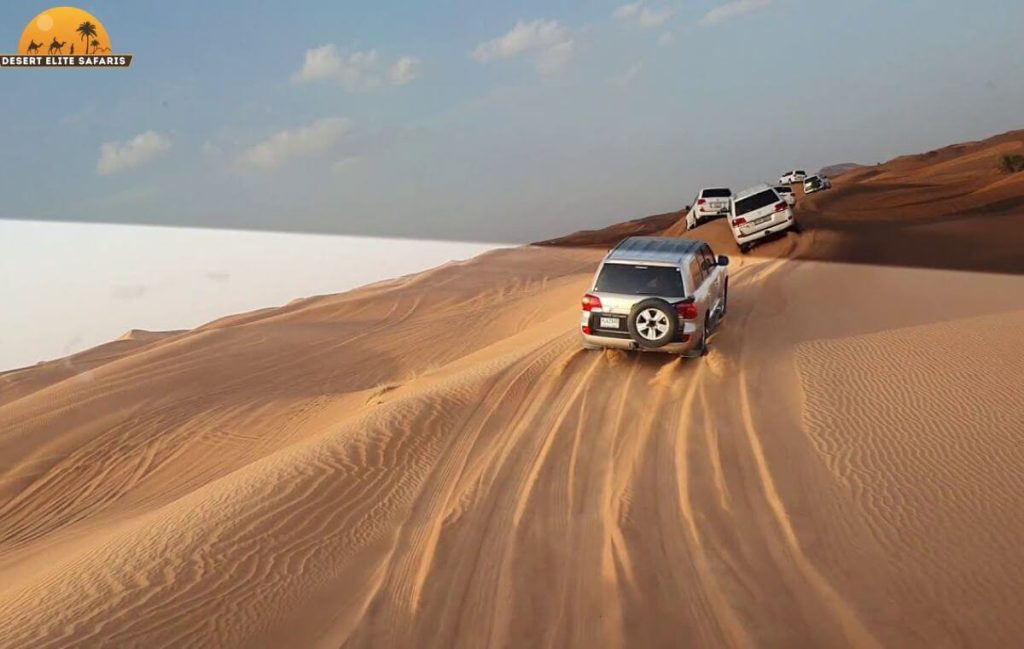 Lahbab Red Dunes Dubai desert safari 2025 – tall red sand dunes for dune bashing, quad biking, and sunset photography