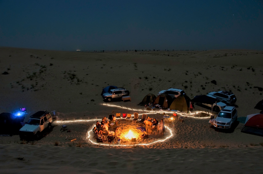 Overnight Desert Safari camping experience with Bedouin-style tents in Dubai